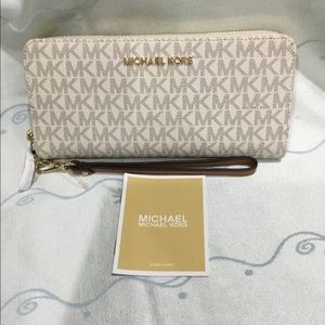Authentic brand Michael Kors Wristlet